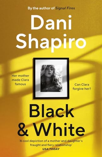 Book cover: yellow background, black and white portrait in a frame, title “Black & White”.