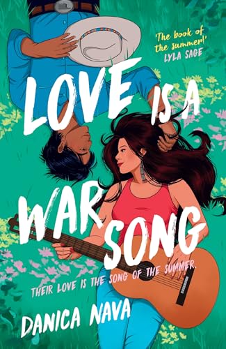 A man in a cowboy hat and a woman holding a guitar lie in grass.