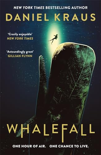 Book cover showing a diver swimming above a large whale in dark deep water.