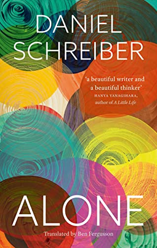 Book cover for "Alone" by Daniel Schreiber with colorful abstract circles.