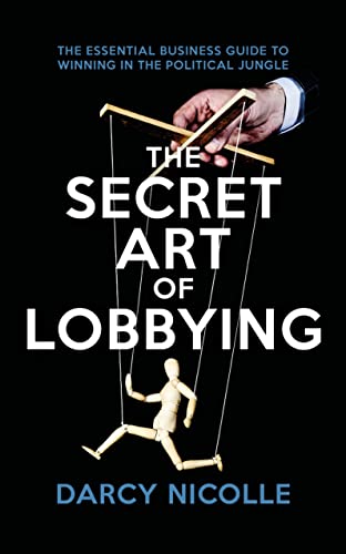 Book cover depicting a hand manipulating a wooden puppet with strings.