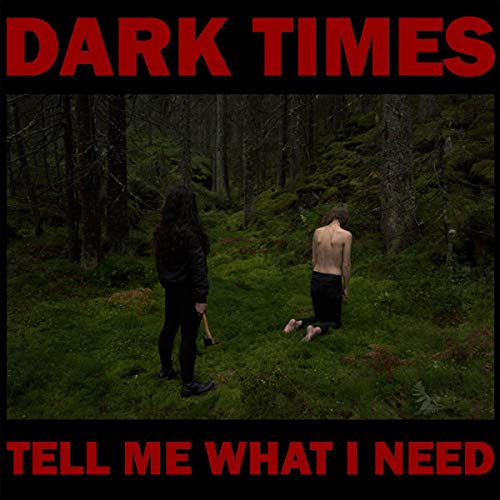 A person stands over another kneeling in a mossy forest with red text overlays.