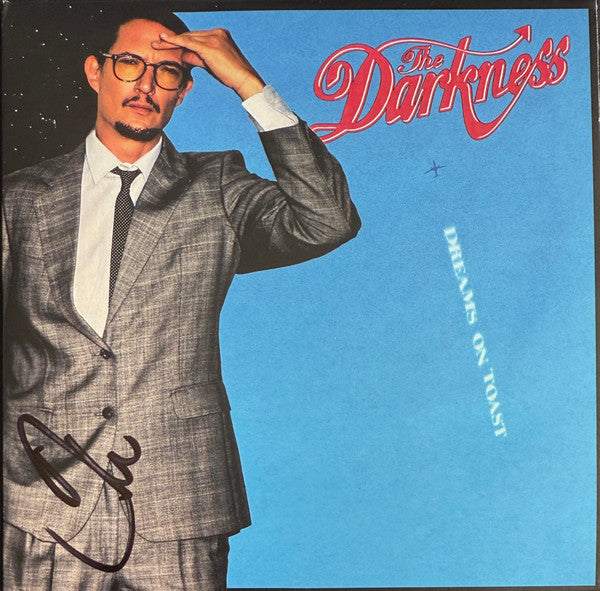 Album cover for “Dreams On Toast” by The Darkness, featuring Dan Hawkins.