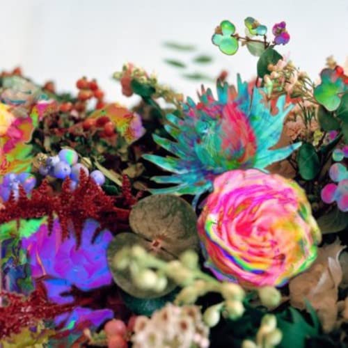Colorful, abstract floral arrangement with vibrant, swirling patterns.