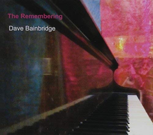CD cover featuring a piano keyboard and abstract red and blue artwork.
