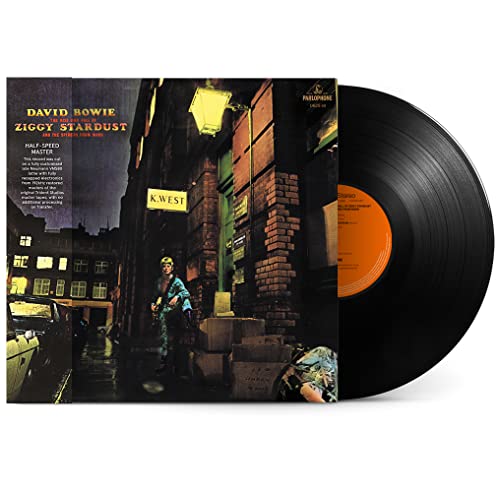 David Bowie’s “Ziggy Stardust” vinyl record with street scene cover art.
