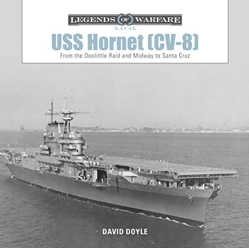 Black and white photo of the USS Hornet aircraft carrier at sea.
