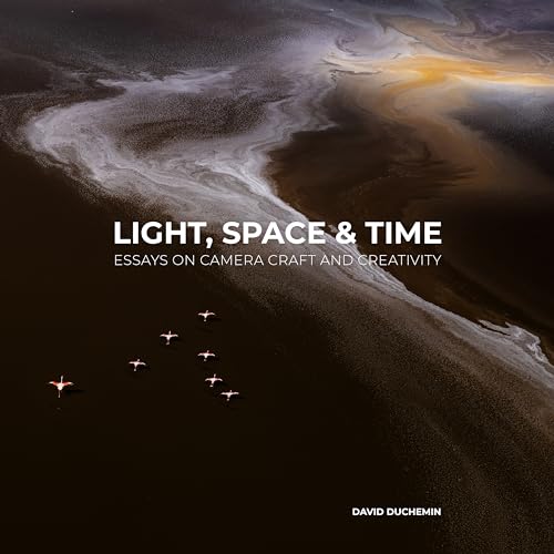 Book cover with aerial beach scene and title “Light, Space & Time.”