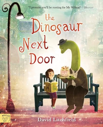 A girl and a dinosaur in a suit share cake on a park bench.