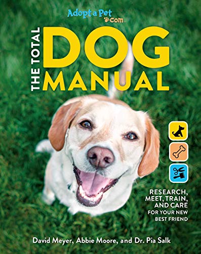 Book cover featuring a smiling dog on a green grass background.
