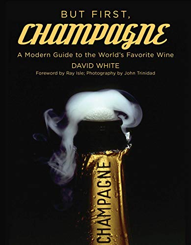 Book cover: "But First, Champagne" with a popped champagne bottle.