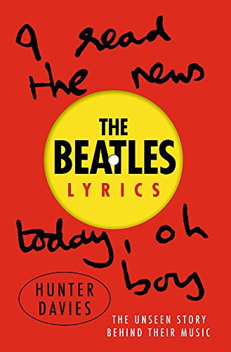 Book cover for “The Beatles Lyrics” with yellow circle and black text.