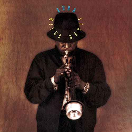 Miles Davis in a hat playing a trumpet, album cover art.