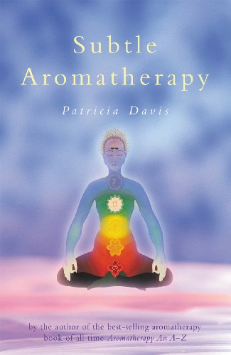 Book cover: "Subtle Aromatherapy" with a meditating figure and chakra alignment.