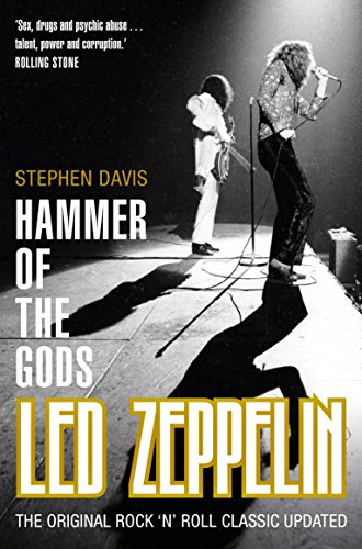 Book cover featuring Led Zeppelin performing on stage with long shadows on the floor.