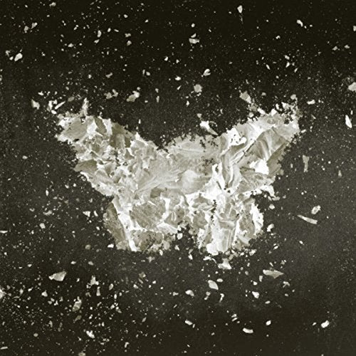 CD cover with a textured, white butterfly shape on a dark background.