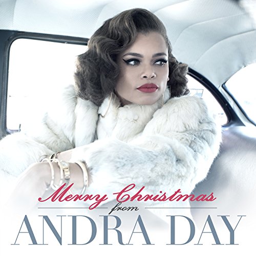 Andra Day album cover, featuring her in a white fur coat.