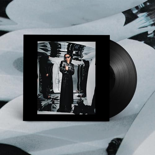 Erika de Casier Still vinyl record with cover art featuring a person in sunglasses.