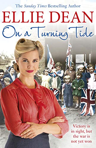 Book cover: woman in red, wartime scene, Union Jacks, "On a Turning Tide.