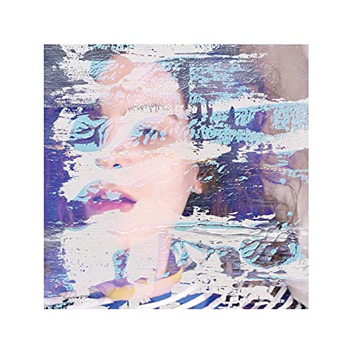 A person's face partially obscured by textured, peeling blue and white paint layers.