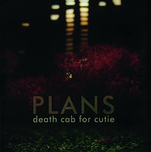 Album cover for Death Cab For Cutie’s “Plans” with red bushes and lights.