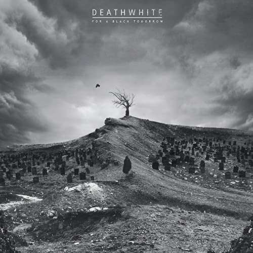 Black and white album cover with a barren landscape and lone tree.