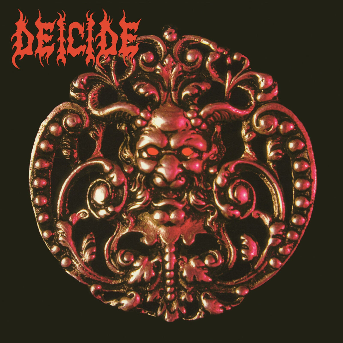 Deicide album cover featuring a red, ornate, demonic face on black.