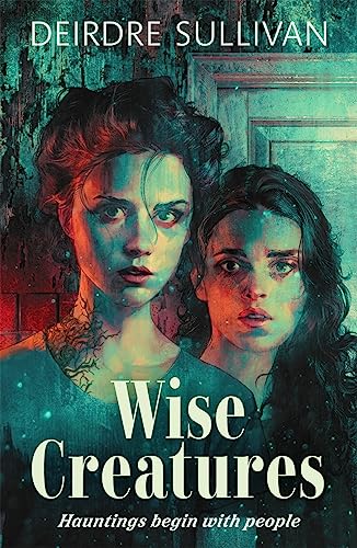 Book cover: two women with dark hair, title “Wise Creatures” below.