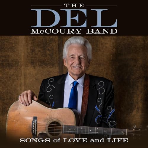 Del McCoury Band album cover featuring a smiling man with a guitar.