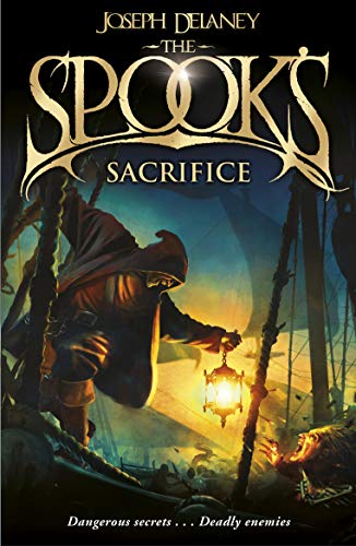 Book cover: hooded figure with lantern in a dark, misty landscape.
