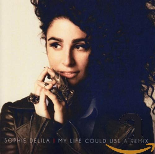 CD cover featuring Sophie Delila, a woman with dark curly hair.