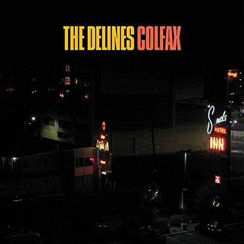Nighttime view of a motel and buildings, album cover for The Delines’ Colfax.