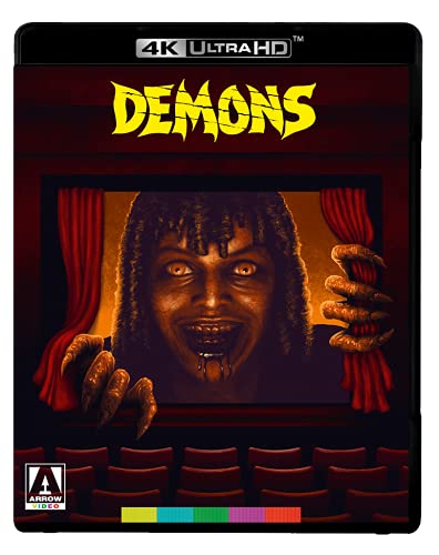 Demons" Blu-ray cover featuring a frightening face and clawing hand in a theater.
