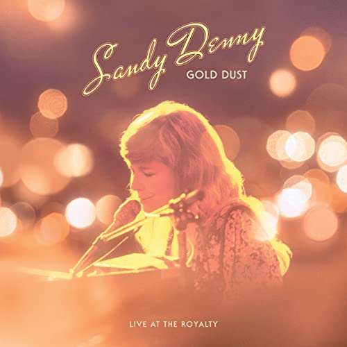 Sandy Denny singing into a microphone at a piano, album cover.