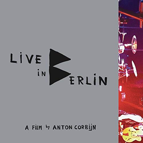Depeche Mode "Live in Berlin" CD cover with play symbol and drums.