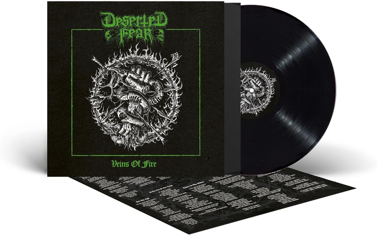 Black vinyl record with ornate, dark green and silver cover art.