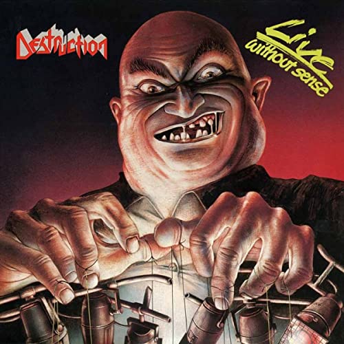 Album cover: angry, exaggerated face with a man at a drum kit.