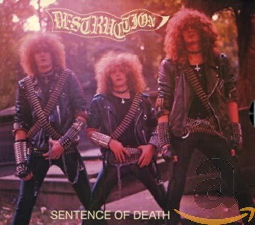 CD cover: Three metal musicians with long hair and studded leather jackets.