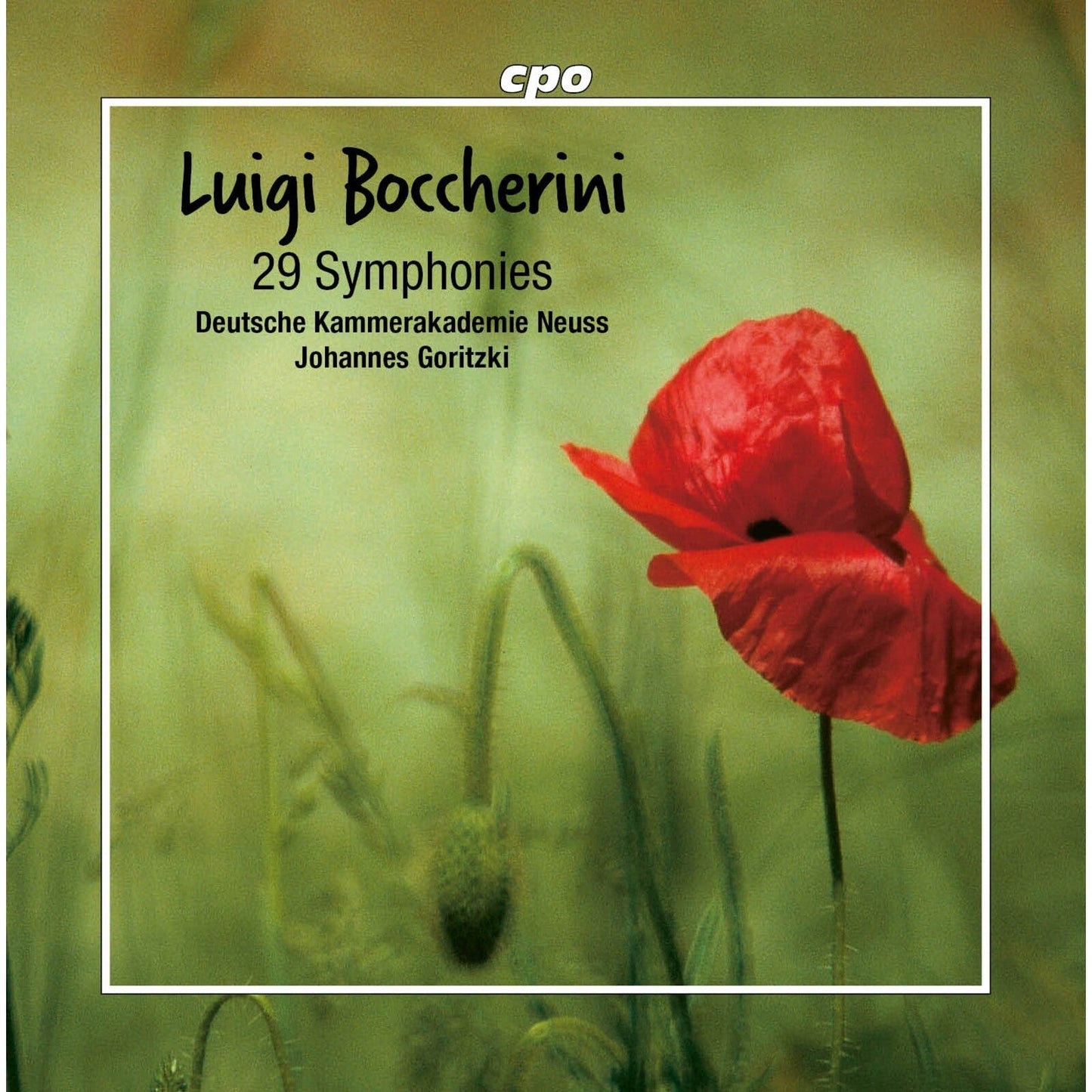 CD cover with red poppies against a blurred green background.