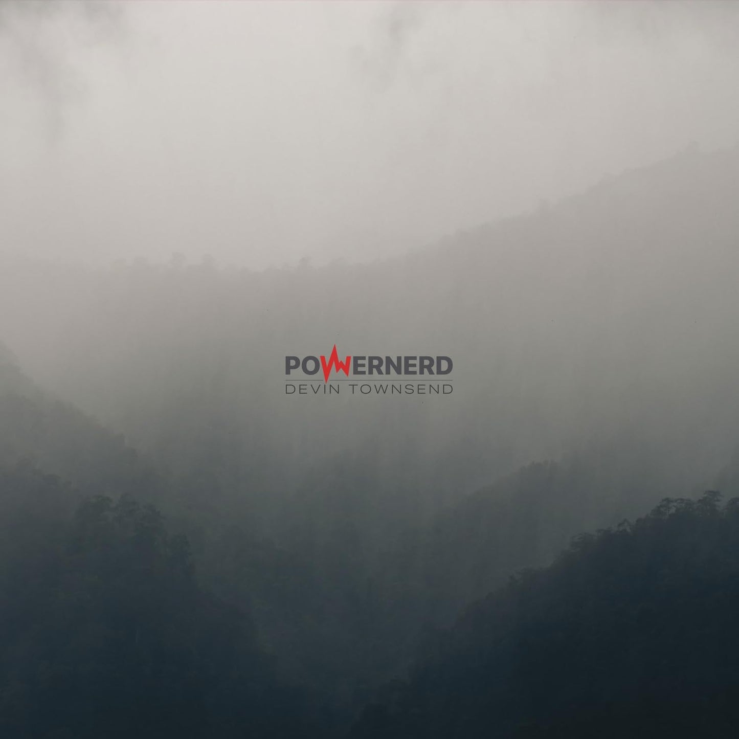 Devin Townsend’s “PowerNerd” album cover with misty mountain landscape.