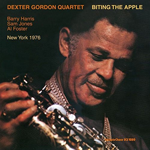 Dexter Gordon portrait with saxophone, album cover for “Biting the Apple.”