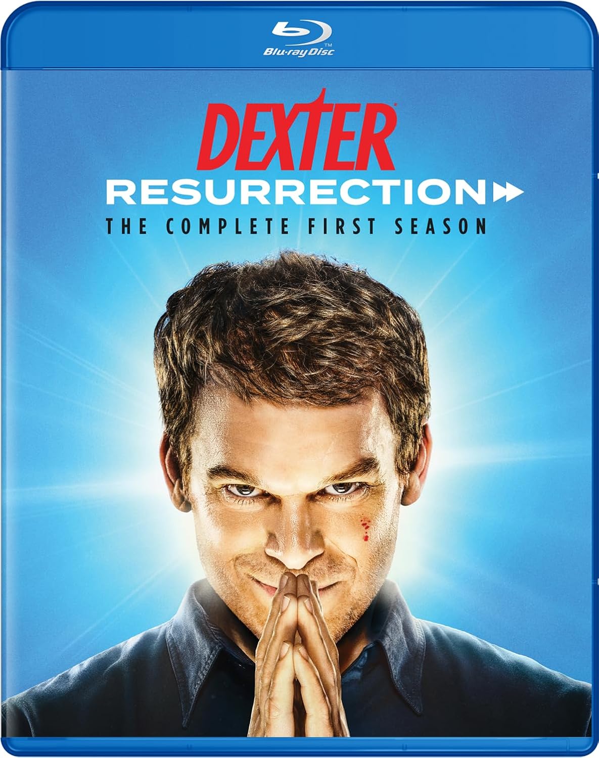 Blu-ray cover for Dexter: Resurrection featuring a man with hands pressed together.