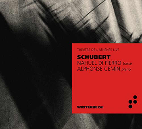 A CD cover with a red label and black-and-white fabric background.
