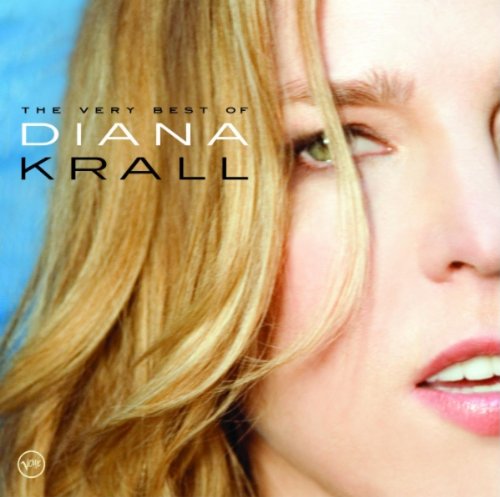 Close-up of Diana Krall with blonde hair against a blue background with album text.