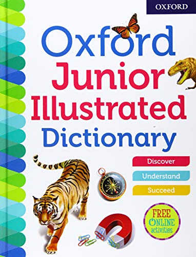 Cover of the Oxford Junior Illustrated Dictionary featuring a tiger, butterfly, and compass.