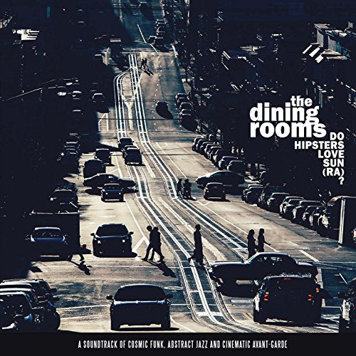 Vinyl album cover: a city street viewed from above, text overlay.