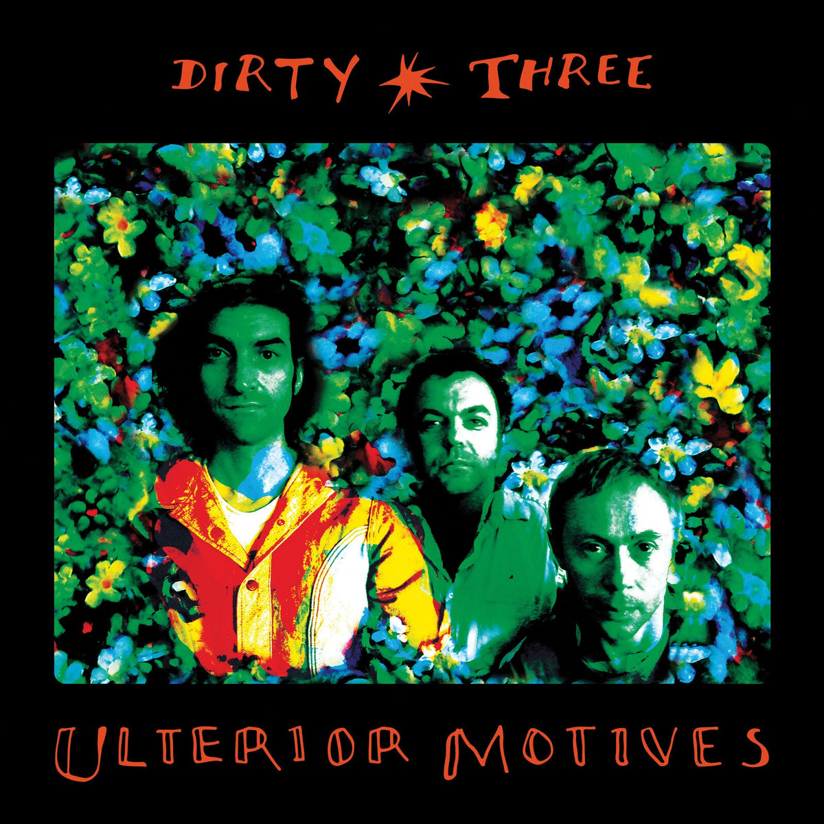 Album cover for Dirty Three’s “Ulterior Motives” featuring three men in flowers.