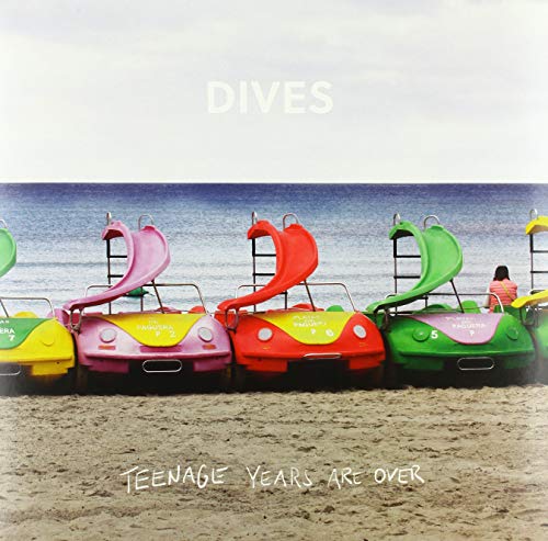 Album cover for Dives, featuring colorful pedal boats on a beach.