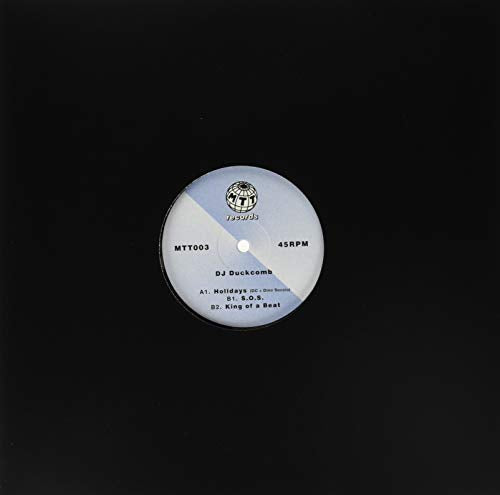 Vinyl record label with artist "DJ Duckcomb" and tracklist details.