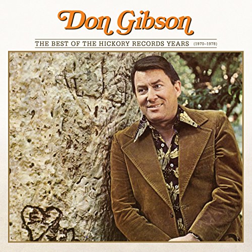 Don Gibson leaning against a tree on the cover of his music CD album.